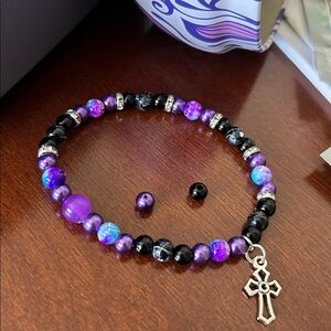 Purple and Black Beaded Bracelet with Cross Charm